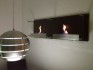 Innoative kamin med dubbla brännare. Elegant design som passar in i de flesta hem.